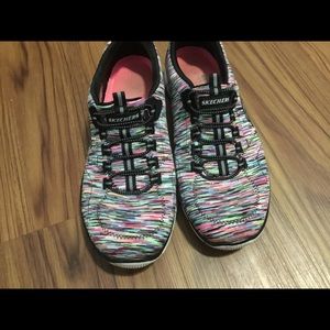 Sketchers slip on shoes.